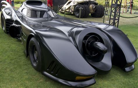 The Batmobile is the fictional car driven by the superhero Batman. Housed in the Batcave, which it accesses through a hidden entrance, the Batmobile is both a heavily armored tactical assault vehicle and a personalized custom-built pursuit and capture vehicle that is used by Batman in his fight against crime. … See more